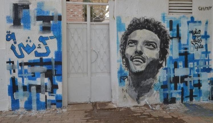 التشكيليون السودانيين يعيدون رسم جداريات الثورة