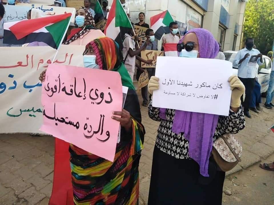 السودان: ذوي الإعاقة في اليوم العالمي يخرجون في موكب بالخرطوم رفضا لاتفاق البرهان وحمدوك .. بالصور